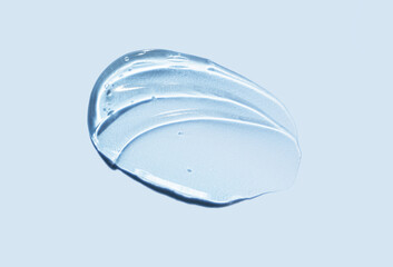 Cream gel gray blue transparent cosmetic sample texture with bubbles isolated on blue background....