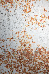 Painted old metal surface with rust appearing. The texture of painted metal.