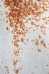 Painted old metal surface with rust appearing. The texture of painted metal.