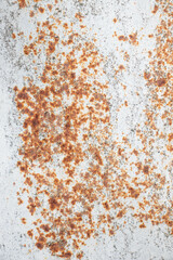 Painted old metal surface with rust appearing. The texture of painted metal.