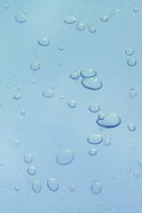 Cosmetic beauty product sample swatch. Liquid gel on a digital screen of microscope or sparking water