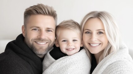 Happy family portrait, smiling parents and child