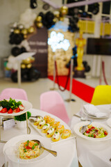 Assorted canapes for the festive table. Catering services for banquets. 