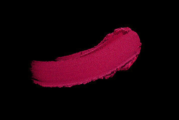 Cosmetic beauty make up product swatch sample . Lipstick smudge purple fuchsia claret colored isolated on black background