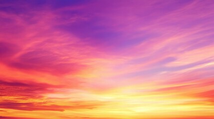 Obraz premium Vibrant sunset sky with hues of orange, pink, and purple, evoking tranquility and beauty