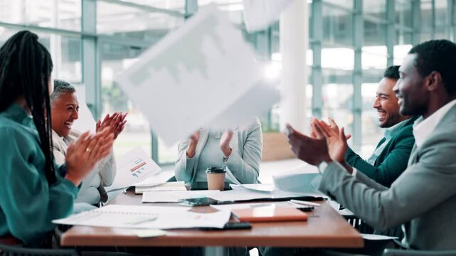 Business, people and celebration with paperwork throw for sales achievement, KPI growth and applause. Finance teamwork, documents and excited in office for good news, funding approval and opportunity