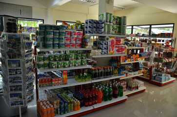 Fototapeta premium Assortment variety snack food and beverage product for thai people and foreign travelers select buy eat drink in local convenience store shop at Ao Nang Railay bay on April 23, 2011 in Krabi, Thailand