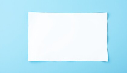 Blank White Sheet of Paper on a Light Blue Background
