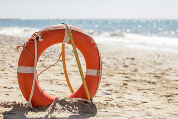 Float on the beach sand, ready for emergencies with vacationers enjoying the summer days. Tools for...