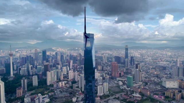 Panorama of Kuala Lumpur, Malaysia on a sunny day. Aerial drone view of Merdeka 118 tower megastructure