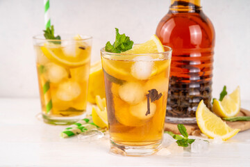 Iced tea cocktail drink, cold summer drink with black tea