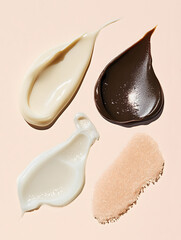 Samples smears of various types of skin care cosmetics on a pastel beige background
