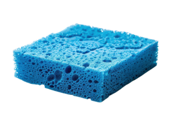Bright blue sponge resting on a clean surface ready for cleaning tasks in kitchens or bathrooms