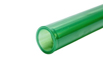 Transparent green plastic tube lying on a white surface ready for crafting or scientific experiments