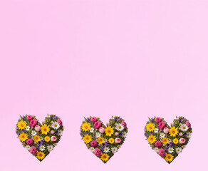 Hearts with flowers card on pink