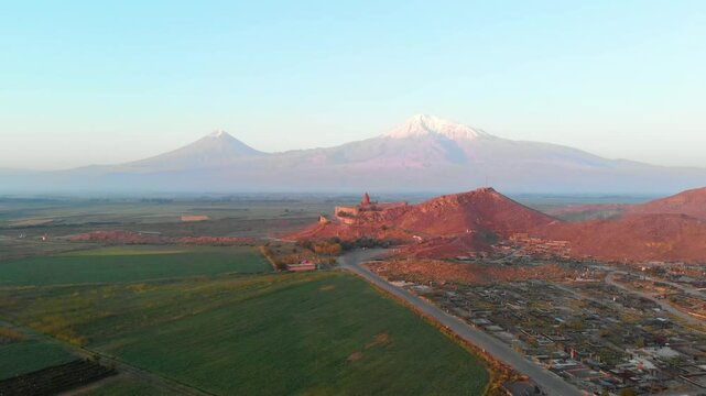 The drone flies to the side Ancient Armenian church Khor Virap with Ararat, Armenia