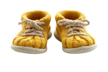 Adorable handmade baby booties soft yellow knit with creamy laces tiny and delightful perfect for on transparent background