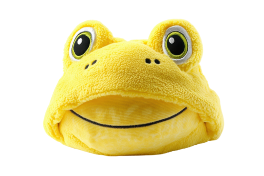 Adorable yellow frog plush toy smiling cheerfully against a black background Soft fluffy texture with on transparent background