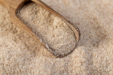 whole flour with bran, fresh wheat flour close-up, flour for making bread with bran, close up