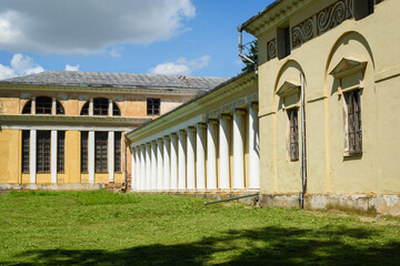 Facade with columns of an old country building.