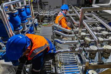 Male work inspection process stainless steel pipe stainless with pressure meter in equipment tank facility for drink cellar at the with vertical stainless valve