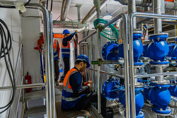 Male work inspection process stainless steel pipe stainless with pressure meter in equipment tank facility for drink cellar at the with vertical stainless valve