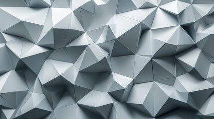 Obraz premium A geometric grey background with sharp triangular patterns, creating a futuristic look
