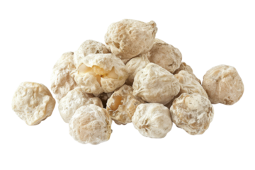 Unique dried seeds collected from tropical trees, perfect for crafting and decoration, displayed on a plain surface