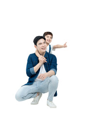 Full body image of Asian father and son posing on background	
