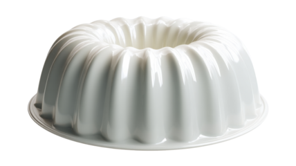 Empty white bundt cake pan with fluted sides on transparent background