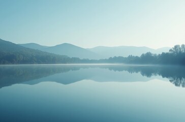 Obraz premium Morning mountain landscape reflecting in a still lake