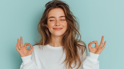 Fototapeta premium A woman with long brown hair is smiling