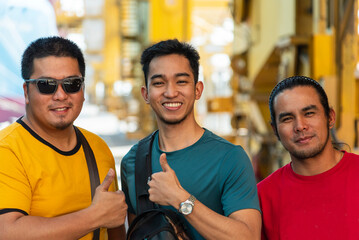 Three seafarers leaving the ship for a break in the city - an authentic moment of friendship and...