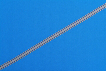 Fototapeta premium close up of a blue cloth with a white stripe