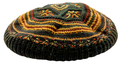 Jamaican Rastafarian tam hat with green-yellow-red pattern, isolated side view  
