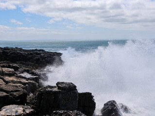 waves crashing on rocks
