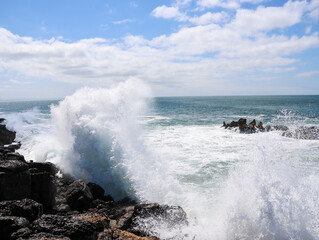 waves breaking on the beach