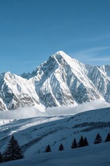 Fototapeta premium mountains covered in snow and clouds with a person on skis