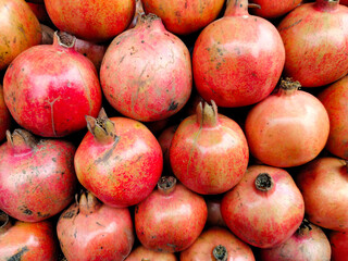 A pile of fresh pomegranate.