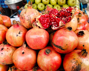 A pile of fresh pomegranate.