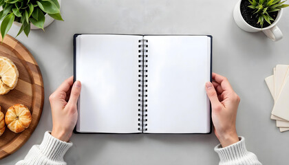 man holding blank notepad
