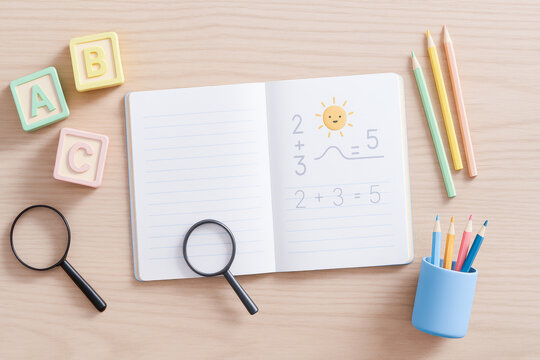 open notebook with math equations, magnifying glasses, and colorful pencils on wooden desk