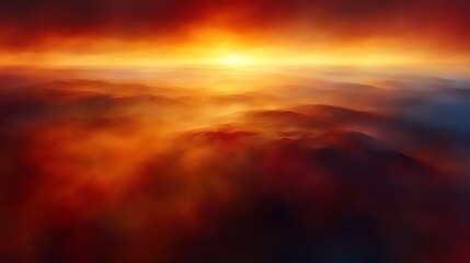 Fototapeta premium Fiery Sunset Over Misty Mountain Ranges
