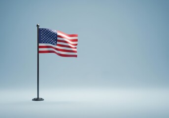 Fototapeta premium The iconic American flag stands proud, its stripes and stars displayed in a clean studio setting.