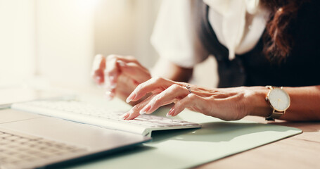 Hands, keyboard and typing with business person closeup at desk in office for email or report....