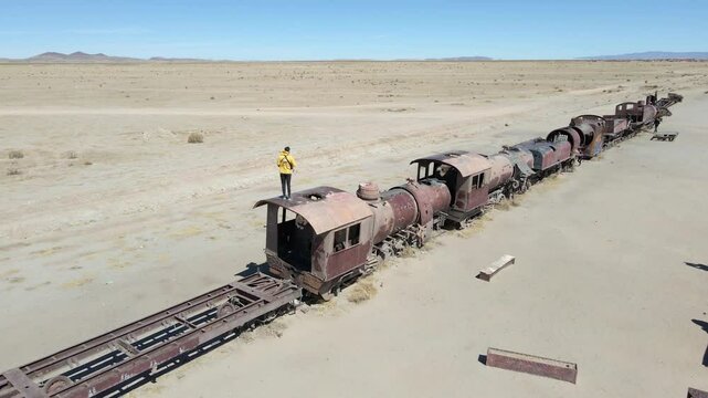 Uyuni desert Train cemetery Bolivia graveyard tourist attraction, aerial drone South America