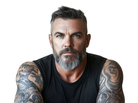 Confident mature man with grey beard and tattooed arms in sleeveless shirt, intense masculine portrait on transparent background