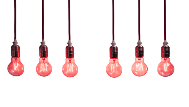 Illuminated red light bulbs hanging from cords against a dark transparent background in a studio setting png