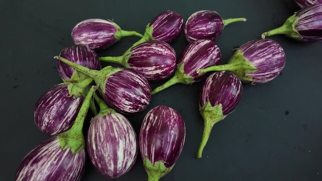 Eggplant falls into a brinjal in slow motion