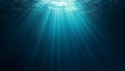 Fototapeta premium Underwater sea background with sun rays in deep blue tones